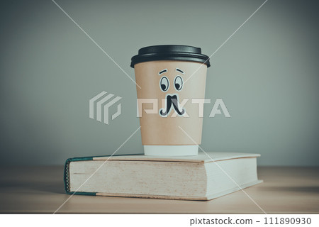 Cute cup of coffee and a book Cute cup of coffee and a book 111890930
