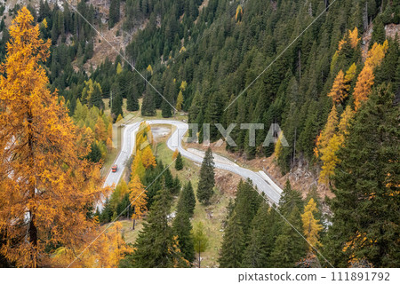 Scenic winding road at Maloja pass in autumn Scenic winding road at Maloja pass in autumn 111891792