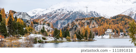 St. Moritz and lake in autumn, surrounded by snowcapped mountains 111891818