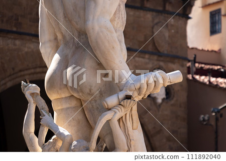 Statue of the famous Neptune fountain at the Piazza della Signoria in Florence 111892040