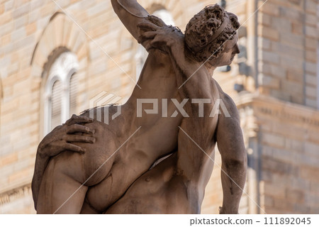 Statue of the Rape of the Sabines from artist Gimabologna in the Loggioa dei Lanzi in Florence 111892045