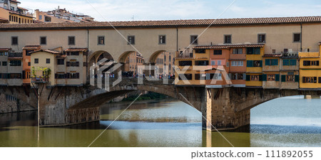 Famous Ponte Vecchio from medieval times in the city center of Florence Famous Ponte Vecchio from medieval times in the city center of Florence 111892055