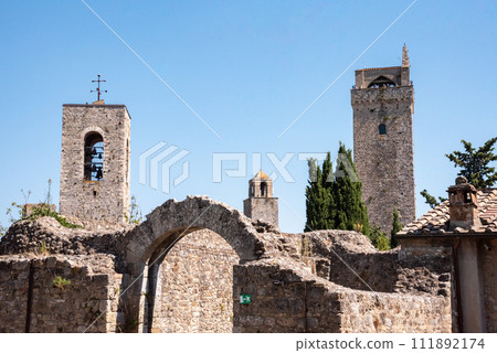 Tower Grosso and the cathedral bell tower of San Gimignano Tower Grosso and the cathedral bell tower of San Gimignano 111892174