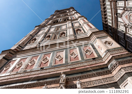 Facade of the campanile of the cathedral Santa Maria del Fiore in Florence 111892291