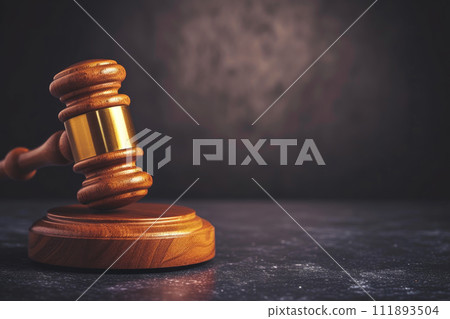 Courtroom Echoes: Gavel Against a Black Background Courtroom Echoes: Gavel Against a Black Background 111893504