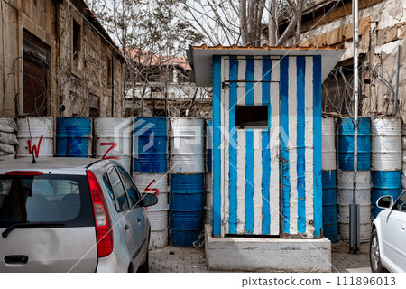 Guard post painted in the colors of Greek flag at The Green Line in Nicosia, Cyprus 111896013