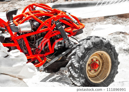 Custom 4x4 off-road car climbing a hill 111896991