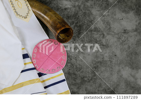 Jews celebrate Orthodox holidays with prayer shawls, kippahs, shofar Jews celebrate Orthodox holidays with prayer shawls, kippahs, shofar 111897289