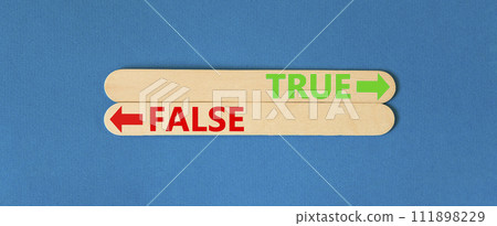 True or false symbol. Concept word True or False on beautiful wooden stick. Beautiful blue table blue background. Business and true or false concept. Copy space. 111898229
