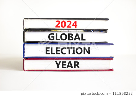 2024 global election year symbol. Concept words 2024 global election year on beautiful books. Beautiful white table white background. Business 2024 global election year concept. Copy space. 2024 global election year symbol. Concept words 2024 global election year on beautiful books. Beautiful white table white background. Business 2024 global election year concept. Copy space. 111898252