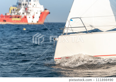 Close-up of a yacht during regatta Close-up of a yacht during regatta 111898490