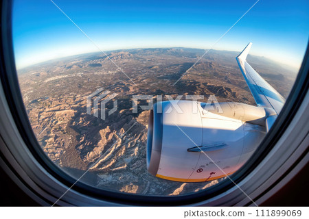 A view from the window seat taking off from Alicante. Spain 111899069