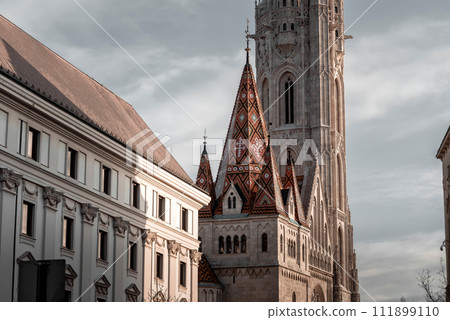 Matthias church in Fisherman bastion at sunset, Budapest, Hungary 111899110
