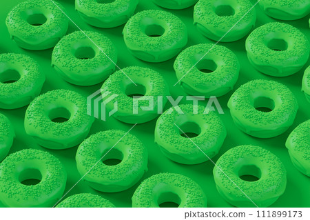 Isometric view of glazed donut with sprinkles on plain monochrome green color 111899173