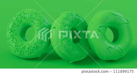 Stack of glazed donut with sprinkles on plain monochrome green color Stack of glazed donut with sprinkles on plain monochrome green color 111899175