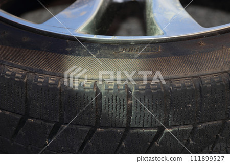 pile of studless tires 111899527