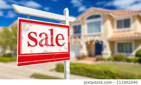 AI-generated content. red and white "Sale" sign on a post with a blurred background of a suburban house and blue sky with clouds 111902040