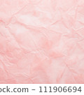 Pink wrinkled paper crumpled grunge abstract bright watercolor background. Vintage blank soft pale light pastel color pattern design of old rose texture rough crease sheet 111906694