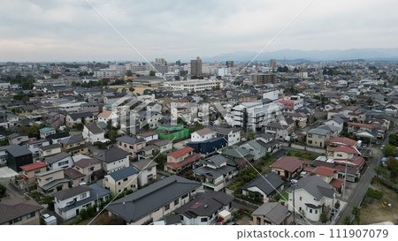 The dynamism of Koriyama City - Aerial view overlooking the city center 111907079