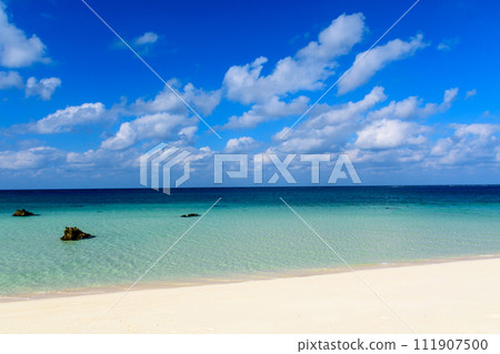 White sand beach and blue sea White sand beach and blue sea 111907500