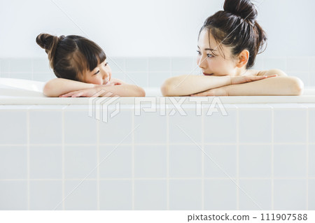 Parent and child entering the bath Parent and child entering the bath 111907588