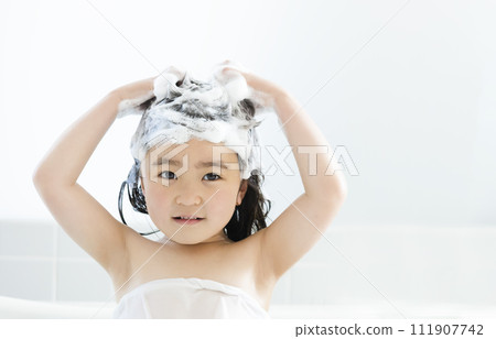 Girls washing their hair 111907742