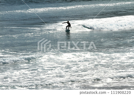 People surfing at Koigaura in Miyazaki People surfing at Koigaura in Miyazaki 111908220
