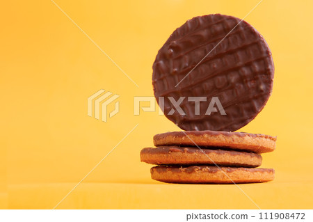 Chocolate coated cookie. Chocolate coated cookie. 111908472