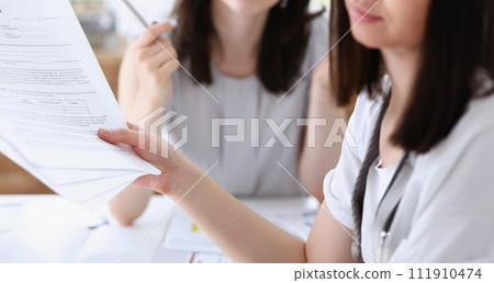 Group of people deliberate on problem with 111910474