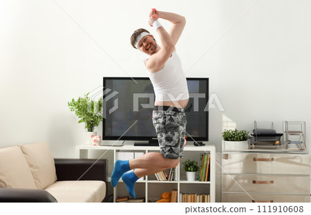 young caucasian brunette man jump 111910608