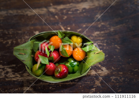 top view of Fruit shaped gelatin dipped mung bean dessert 111911116