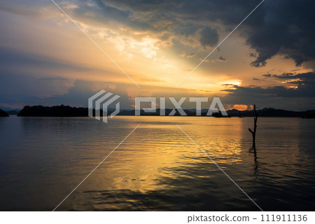 rays of sunset through cloud at Pom Pee reservoir viewpoint rays of sunset through cloud at Pom Pee reservoir viewpoint 111911136