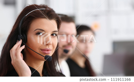 Three call centre service operators at work 111911166