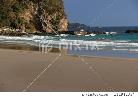 Tatadohama beach at Shimoda on the Izu penninsula of Shizuoka Japan, famous for beautiful white sand, surfing, and nearby onsen hot spring mineral baths 111912334