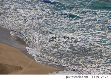 Tatadohama beach at Shimoda on the Izu penninsula of Shizuoka Japan, famous for beautiful white sand, surfing, and nearby onsen hot spring mineral baths Tatadohama beach at Shimoda on the Izu penninsula of Shizuoka Japan, famous for beautiful white sand, surfing, and nearby onsen hot spring mineral baths 111912373