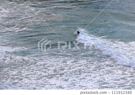 Tatadohama beach at Shimoda on the Izu penninsula of Shizuoka Japan, famous for beautiful white sand, surfing, and nearby onsen hot spring mineral baths 111912380