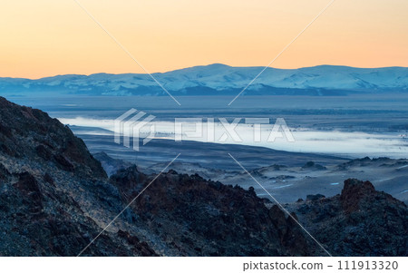 Valley with the river in the distance is covered with fog. Valley with the river in the distance is covered with fog. 111913320