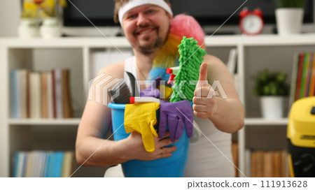 The man was left alone at home smiling 111913628