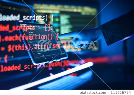 Working atmosphere of a programmer at home . ?oding html and programming on screen laptop, development web Working atmosphere of a programmer at home . ?oding html and programming on screen laptop, development web 111916754