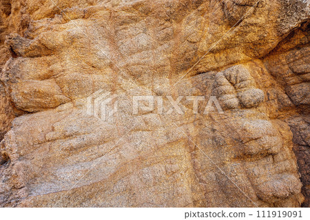 Rock surface with cracks. Natural rock structure. Rock texture. Surface of Wild Stone 111919091