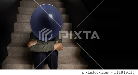Mental Health Concept. a Stressed, Anxiety, Depressed Person with a Balloon sitting on Staircase, Negative Emotion and Feeling. Moody. Dark tone 111919135