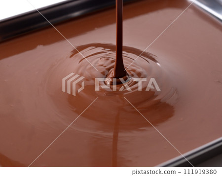Chocolate melts in hot water 111919380