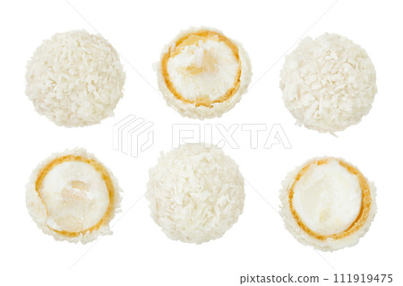round candy raffaello with coconut flakes and nut isolated on white background. Top view. Flat lay. round candy raffaello with coconut flakes and nut isolated on white background. Top view. Flat lay. 111919475