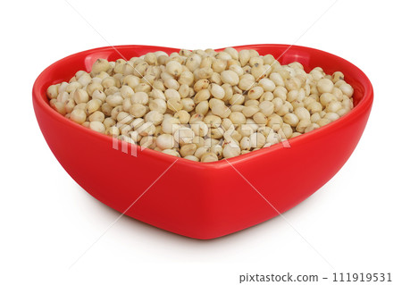 Sorghum seeds in ceramic bowl isolated on white background with full depth of field. Sorghum seeds in ceramic bowl isolated on white background with full depth of field. 111919531