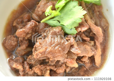 braised beef meat stew topping slice celery on bowl dipping chili sauce braised beef meat stew topping slice celery on bowl dipping chili sauce 111920108