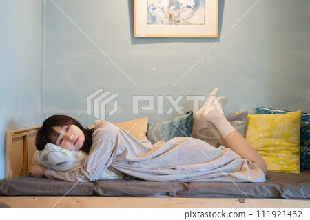 A woman relaxing on the sofa 111921432