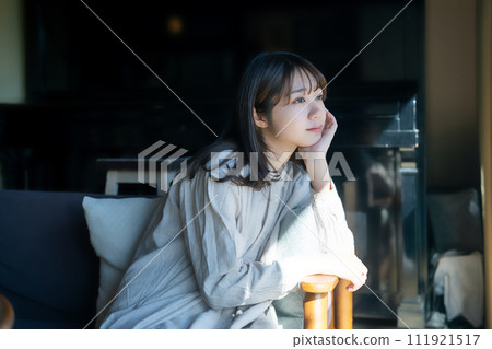 A woman relaxing on the sofa A woman relaxing on the sofa 111921517