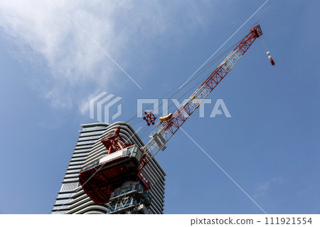Blue sky, tower crane, and Brillia Tower Dojima high-rise building (Photo taken on February 11, 2024) Blue sky, tower crane, and Brillia Tower Dojima high-rise building (Photo taken on February 11, 2024) 111921554