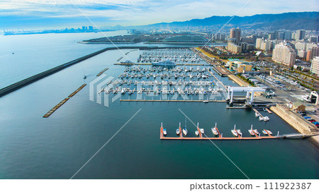 Yacht harbor at Nishinomiya Caisson, a famous fishing spot in Hyogo Prefecture that can only be photographed with a drone Yacht harbor at Nishinomiya Caisson, a famous fishing spot in Hyogo Prefecture that can only be photographed with a drone 111922387