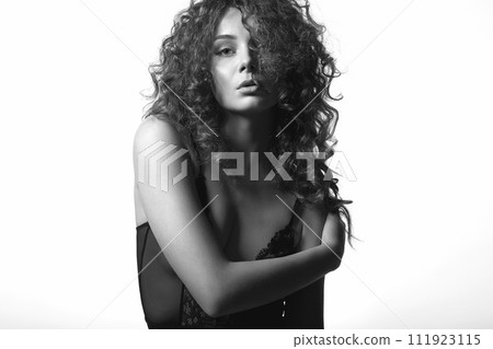 beautiful young woman with curly hair. pretty sexual girl in undewear beautiful young woman with curly hair. pretty sexual girl in undewear 111923115